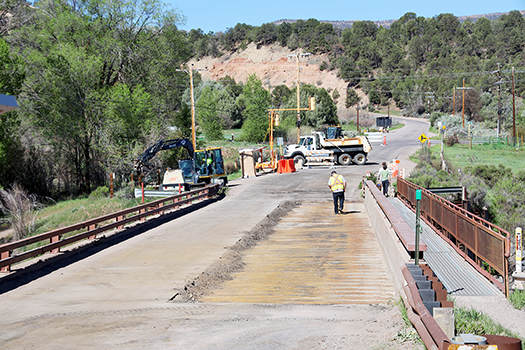 One lane of asphalt has been removed from the bridge over the Crystal River on County Road 108 (Thompson Creek Road) near Carbondale, Colorado.
