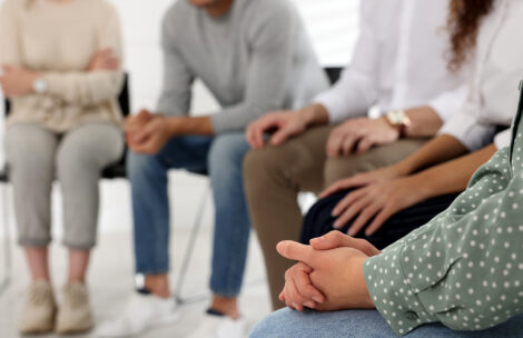 People at group therapy session.