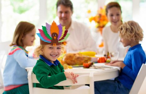 A family gathers for a Thanksgiving meal.