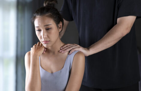 Man consoling a depressed woman.