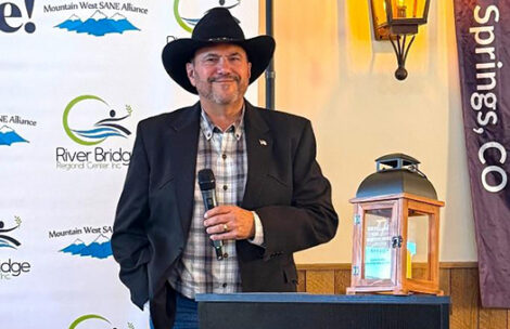 Garfield County Sheriff Lou Vallario speaks after being honored at the River Bridge Regional Center.