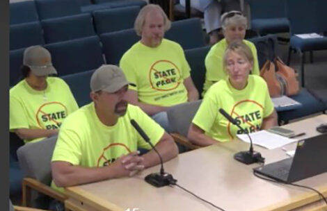 A group of residents from the Sweetwater Lake area speak to the Board of County Commissioners.