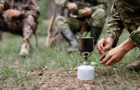 Portable gas burner is used by hunters cooking.