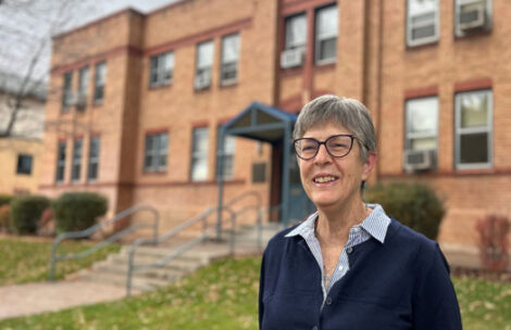 Kathy Lancaster standing in front of the Glenwood Springs Public Health building