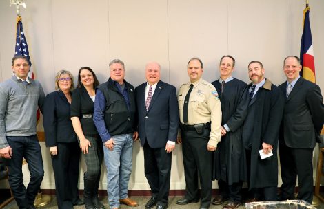 Garfield County's elected officials pose with Ninth Judicial District Judge John Neiley. Shown are Garfield County Assessor Jim Yellico, Clerk and Recorder Jackie Harmon, Treasurer Carrie Couey, Surveyor Scott Aibner, District 1 Commissioner Tom Jankovsky, Sheriff Lou Vallario, Judge Neiley, District Attorney Jeff Cheney, and Coroner Rob Glassmire.