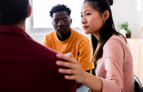 Meeting of young people in group therapy supporting each other's metal health.