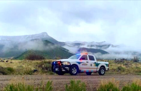 Garfield County Sheriff's Office deputy on patrol in a truck in the mountains.