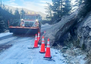 A plow is seen next to rockfall on Highway 82 over Independence Pass. The highway is now closed for the season until spring 2025.