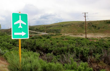Green airport signage near the Rifle Garfield County Airport.