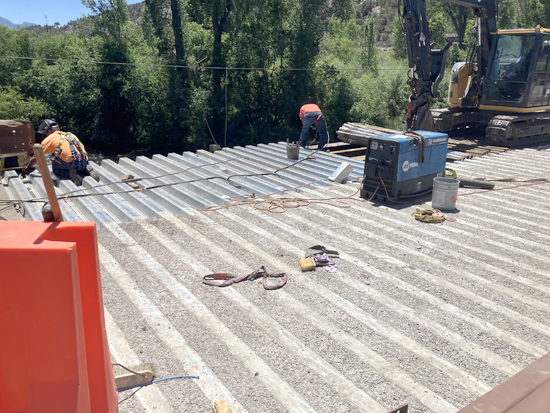 Crews continue repair work on the County Road 108 (Thompson Creek Road) bridge near Carbondale.