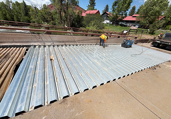 Crews continue repair work on the County Road 108 (Thompson Creek Road) bridge near Carbondale.