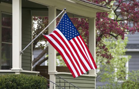 An American flag flies outside a home.