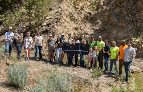 Stakeholders raise their golden trowels on August 5, 2025, for the groundbreaking of the Roan Creek Fish Barrier Project near De Beque.