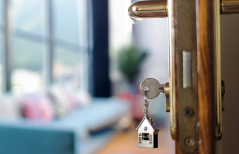 Keys in the door of a newly purchased home.
