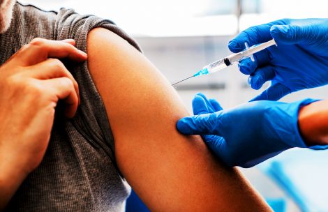 Vaccination of senior person in hospital.
