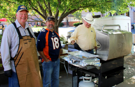 Garfield County Commissioners Mike samson and Tom Jankovsky, and County Manager Fred Jarman cook food at the annual employee appreciation picnic.