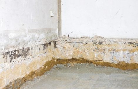 Preparatory stage for the construction of a ventilated crawl space in an old brick building.