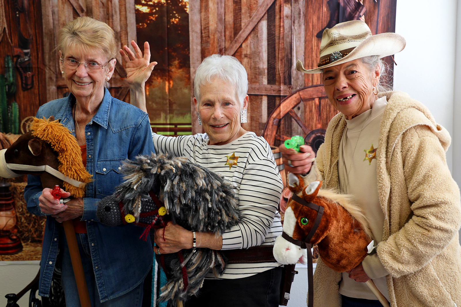 Three women celebrate at the Garfield County Older Adult Programs volunteer brunch.